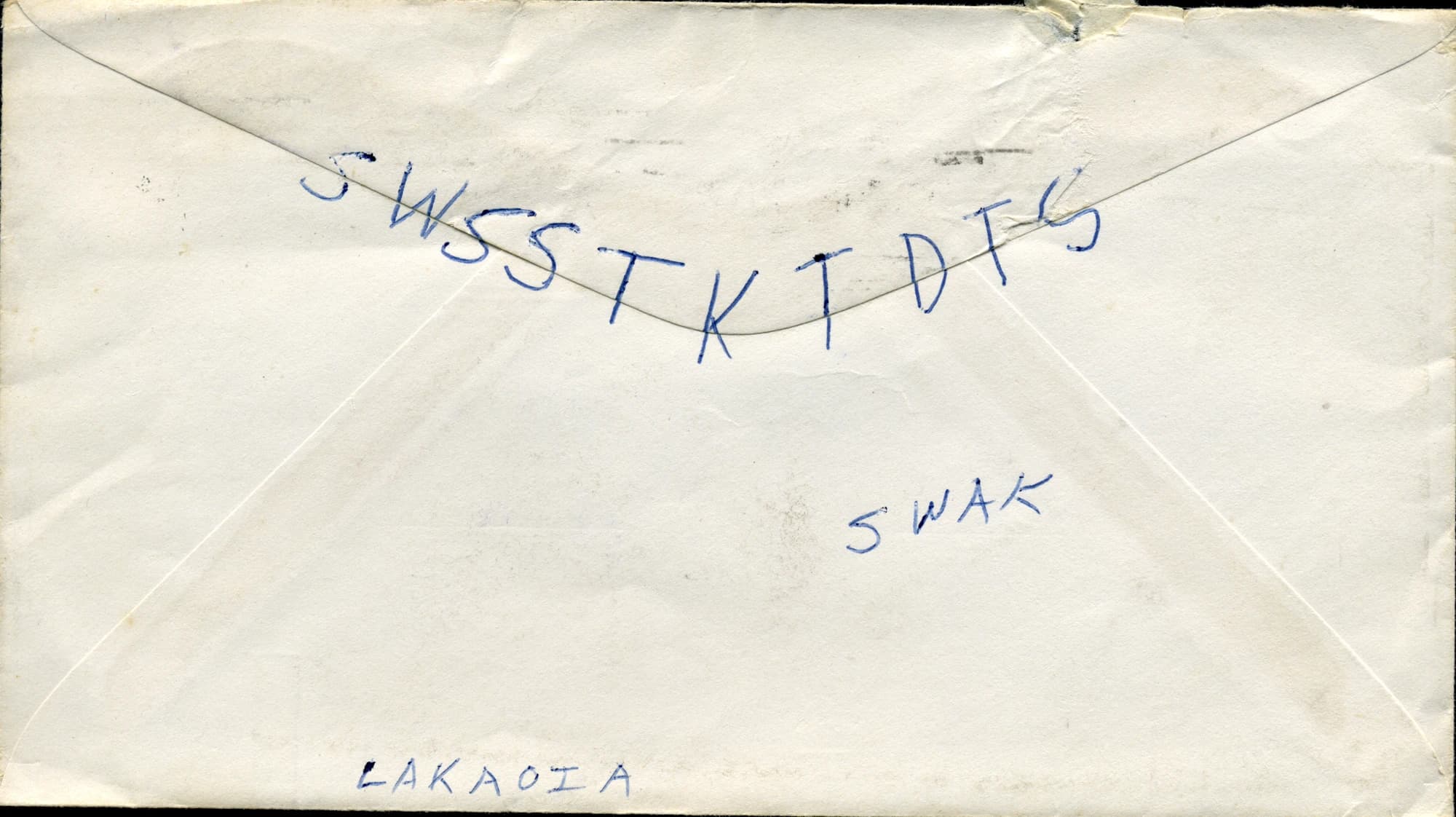 The cryptic-lettered back of Bob's first envelope